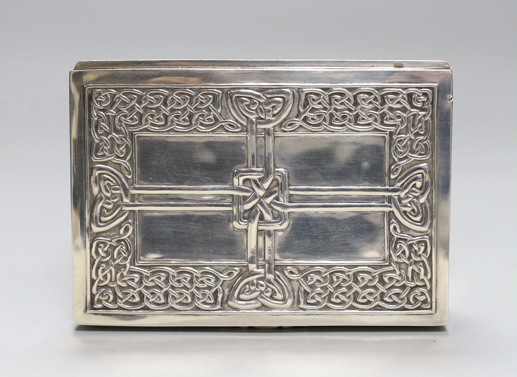 A Scottish white metal Iona rectangular box and cover, with Celtic knot decoration, 13.2cm, 8.7oz, stamped 'Iona AR', for Alexander Ritchie?